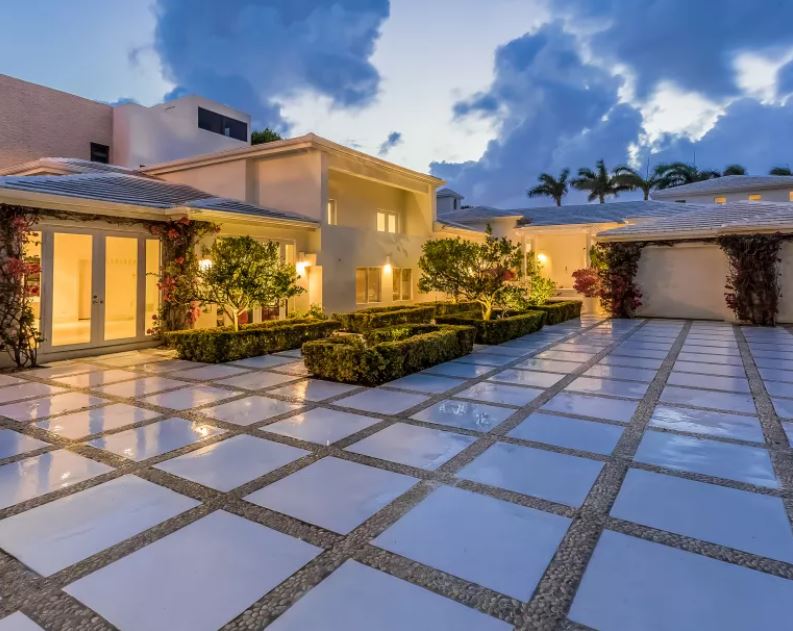 The courtyard leading the the front entry as well as a small garden. 