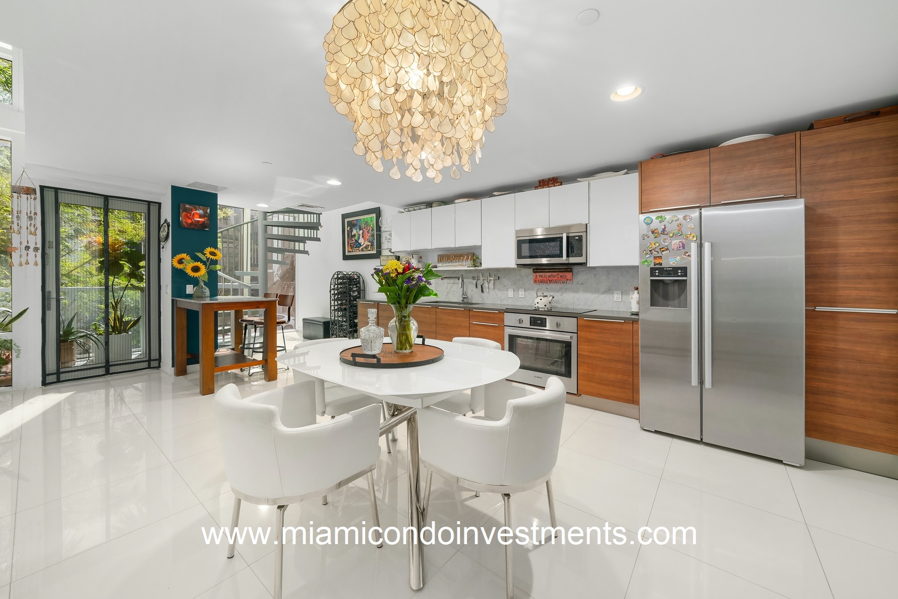 Luxury Kitchen with stainless steel appliances and updated wood cabinets.